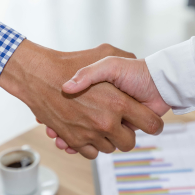 Business people shake hand in meeting