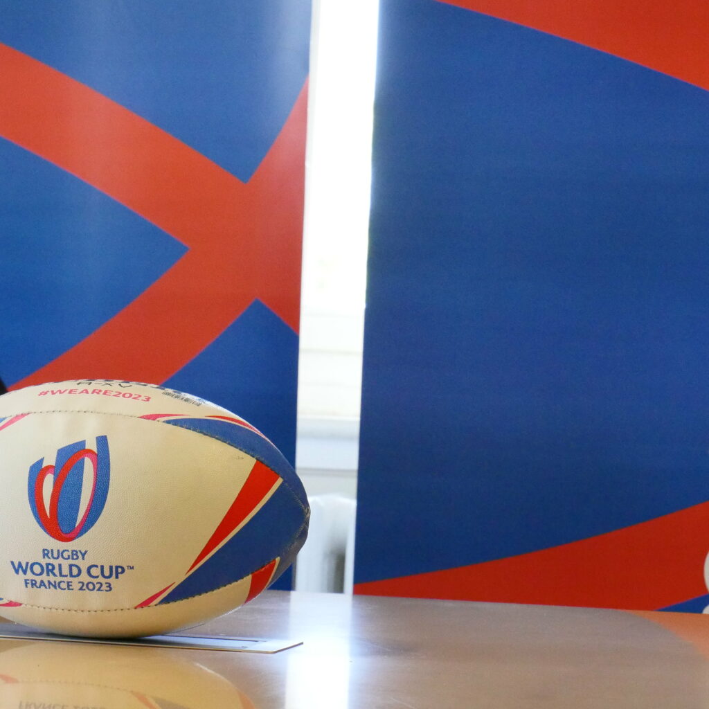 Image représentant un ballon de rugby avec l'inscription "Coupe du Monde 2023"